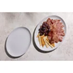 Assiettes coupes ovales Olympia Athena 254 x 197 mm en porcelaine blanche vitrifiée, lot de 12
